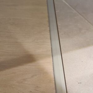TrimAce in Grey / Beige between wood and stone floors