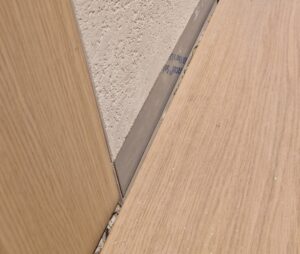 Expansion trim is needed around wood floors