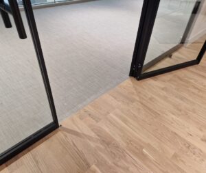 Threshold between wood floor and carpet
